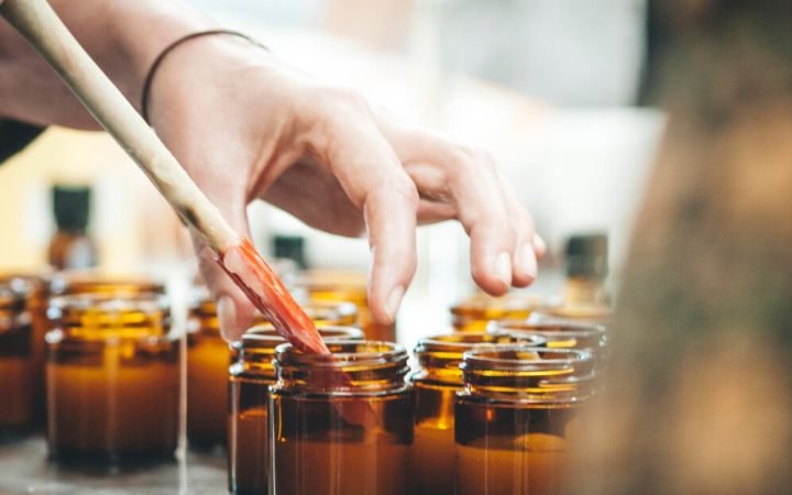 -hands-woman-with-jars-