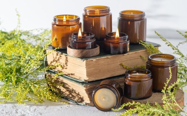 set-different-aroma-candles-brown-glass-jars-scented-handmade-candle-soy-candles-are-burning-jar-aromatherapy-relax-spa-home-still-life-fire-brown-jar_728008-3107